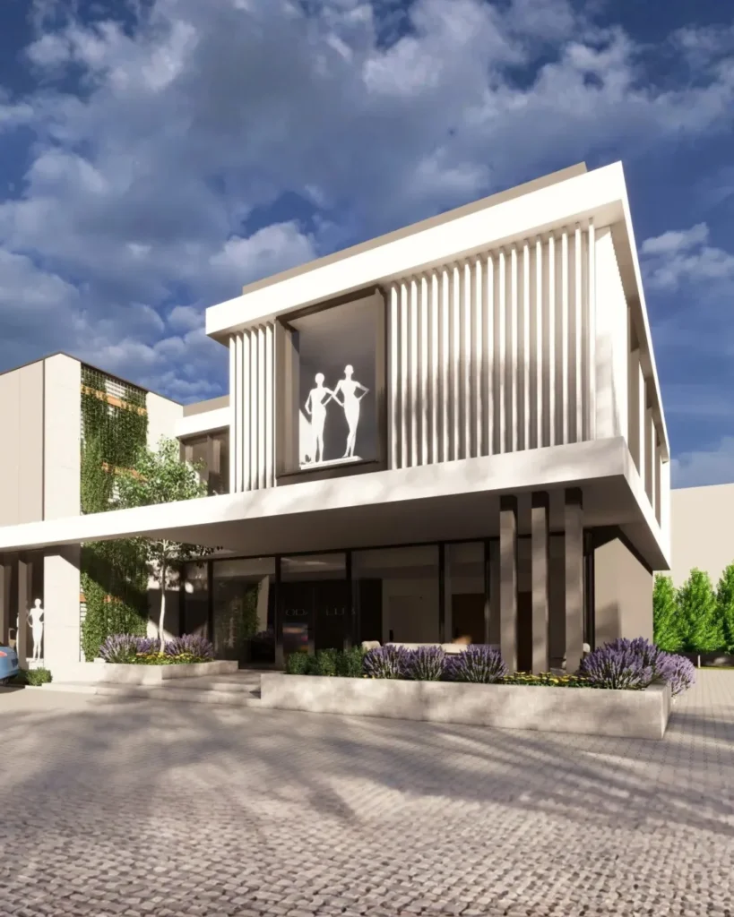 Nowoczesny obiekt biurowo-usługowy o premium charakterze z elegancką elewacją i pionowymi lamelami architektonicznymi. Budynek wyróżnia się minimalistyczną formą, dużymi przeszkleniami oraz reprezentacyjną strefą wejściową otoczoną zielenią. Render architektoniczny przedstawia nowoczesną przestrzeń biznesową łączącą design, funkcjonalność i prestiżowy charakter inwestycji.
